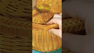 Handweaving a basket with rattan strips [upl. by Chaffee]