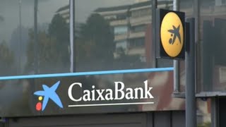 CaixaBank gana casi 4 veces más por la fusión y planea elevar el dividendo [upl. by Amadus704]