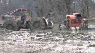 Skidder Pulls Another Skidder And A Chevy 4x4 Out Of DEEP MUD [upl. by Nath937]