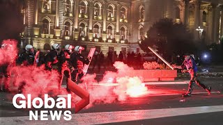 Tensions high after thousands of protesters storm Serbian parliament over planned lockdown [upl. by Dannica]