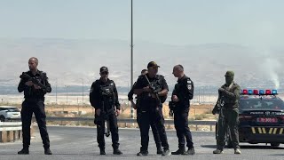 Police and military secure site of deadly attack at crossing between West Bank and Jordan  AFP [upl. by Anniahs]