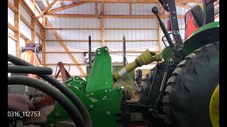 Attaching John Deere Rototiller to John Deere 1025R [upl. by Aiekat]