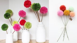 Pom PomsHow to make pom pom flowers with wool  Yarn pom pom flowers  DIYHome Decoration [upl. by Lesley4]