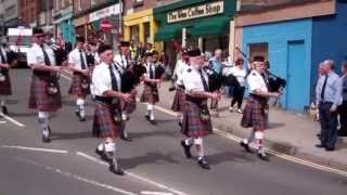 Pipe Band Marching Into Blairgowrie Perthshire Scotland [upl. by Hamas]