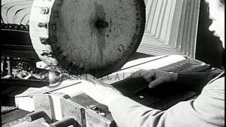 Louis Waynai weighs the worlds largest bible and points at it while Mrs Waynai HD Stock Footage [upl. by Alla592]