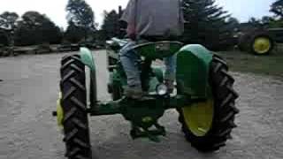 JD Antique 1942 John Deere HN farm tractor two cylinder expo [upl. by Edniya]