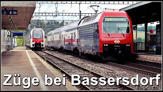 Personenzüge und ein SBB Postzug beim Bahnhof Bassersdorf [upl. by Yennej641]