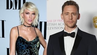 Taylor Swift locks lips with new man [upl. by Adnuhs]