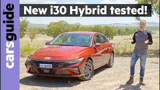 Hyundai i30 Hybrid 2024 review Sedan  New petrolelectric small car targets Toyota Corolla Hybrid [upl. by Florian]