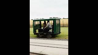 TROLLEYED A Wickham trolley at Oak Tree Halt on the SBR 20724 preserved narrowgauge train [upl. by Ydnys867]