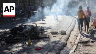 Bodies lie in the street after Haiti neighborhood targeted in gang attacks [upl. by Nollek]