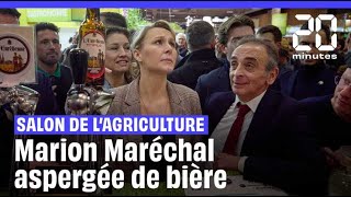 Salon de lAgriculture  Marion Maréchal aspergée de bière [upl. by Ellevehs]