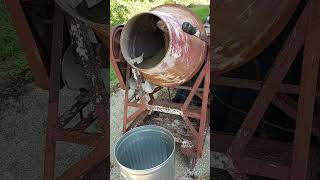 Mixing seed with ancient cement mixer [upl. by Awhsoj]