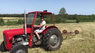 Raking hay with Vicon Acrobat and Massey Ferguson 35 [upl. by Mairb]