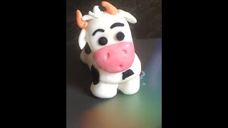 How to make a fondant cow cake decoration beginners طريقة عمل بقرة بعجينة السكر تزيين كيك مبتدأيين [upl. by Wittenburg448]