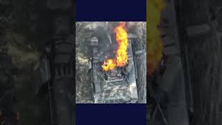 Russian tank catches fire after Ukrainian drone drops grenade on it [upl. by Egidius]