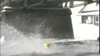 Snowmobile Hits bridge while watercrossing [upl. by Winzler]