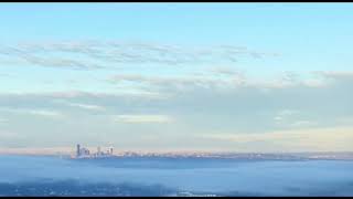 Timelapse clouds over Seattle set to recorder music [upl. by Fitzhugh]