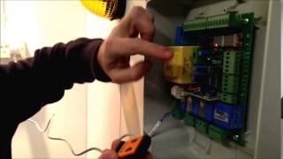 Programming a Roger H80 TX22 Gate amp Garage Remote Control [upl. by Arelus]