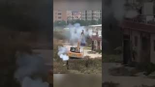 Man Fights Off Excavator with Fireworks to Save His Home [upl. by Jeconiah]