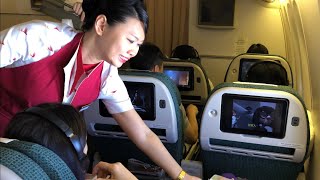 CATHAY PACIFIC Premium Economy Class  B777300ER Hong Kong to Singapore [upl. by Sacksen599]