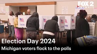 Michigan voters flock to the polls on Election Day [upl. by Dosia]