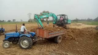 kobelco Excavator loading sonalika tractor unloading system video [upl. by Pallaton]