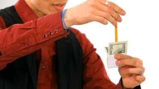 How to Do the Pencil thru Dollar Trick  Magic Tricks [upl. by Ahsiekyt]