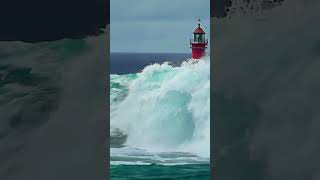 Towering Wave Slams Into Lighthouse Unbelievable scaryocean lighthouse waves [upl. by Mirelle213]