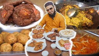 The Economical Street Food in Gulberg Lahore  Chapli Kabab Pakoray Fish Daal Kabab [upl. by Madid]