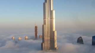 Burj Khalifa and Dubai Downtown are raising from the fog [upl. by Ferrigno]