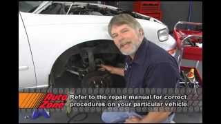 Removing The Front Strut  AutoZone Car Care [upl. by Bahe784]