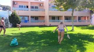 Guests relaxing in the garden  Avra Beach Resort [upl. by Anaitsirc947]