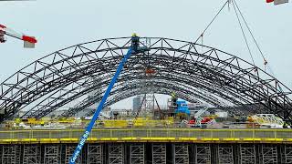 Installation process of the Rail Baltica Riga Central Station roof’s fourth arch [upl. by Hands]