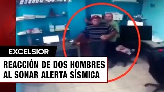 Reacción de dos hombres al sonar Alerta Sísmica en oficina se hace viral [upl. by Emarie]