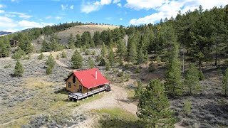 Colorado log cabin for sale Fishing property hunting property Creek borders National Forest [upl. by Eniaj897]