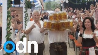 Man sets world record for carrying the most beers [upl. by Whitaker5]