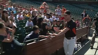 Giants Catcher Buster Posey Hands Out 1000 Gloves To Kids [upl. by Nagek432]