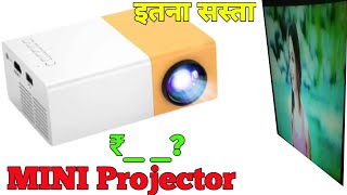 Mini projector unboxing and review  cheap and best mini projector  ibs uc 500 projector  mini [upl. by Jac946]