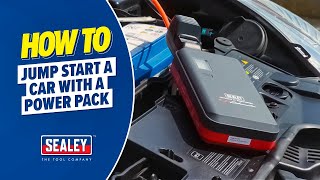 How to jump start a car battery with the portable battery jumper [upl. by Rabbaj295]