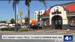 Los Angeles fast food restaurants raise prices to counter wage hike [upl. by Bahr]