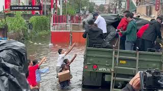 Marcos inspects floodhit areas in Valenzuela Navotas hands relief goods [upl. by Saffren722]