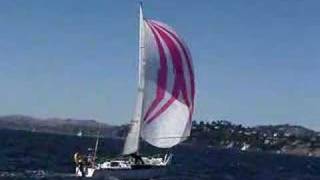 SMALL SAILBOAT UNDER SPINNAKER [upl. by Garrott689]