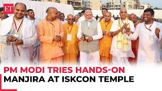 Maharashtra PM Modi tries his hands on Manjira at ISKCON temple in Panvel watch [upl. by Rainger]