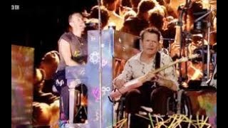 🎸 Michael J Fox Joins Coldplay to Play Guitar During Fix You at Glastonbury 🌟 [upl. by Kellda578]