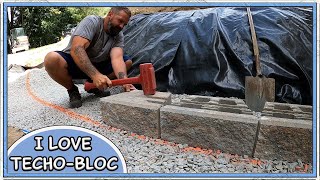 Starting a Curved Concrete Block Retaining Wall [upl. by Mosnar]