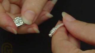 How to add charms to a Pandora Bracelet [upl. by Anitselec]