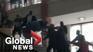 Chaos erupts as lawmakers brawl in Congo parliament [upl. by Meeker]