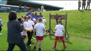 Danny Grainger and Patrick Brough get soaked in the stocks at the fun day [upl. by Rancell653]