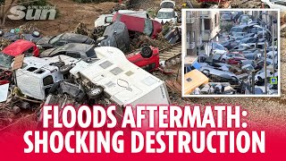 Shocking moment bridge washed away as hundreds of cars left piled up by Spanish floods [upl. by Anilak359]